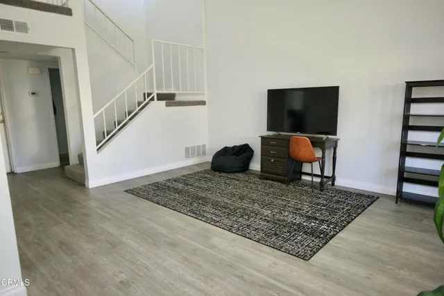 a view of workspace and wooden floor