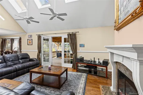 a bedroom with a bed dresser and a window