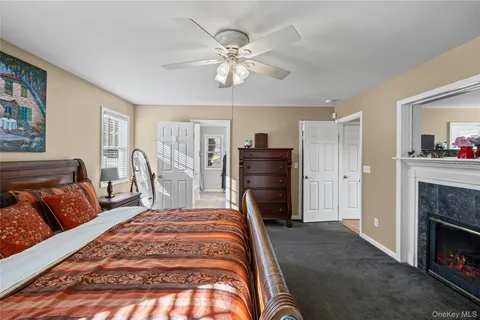 a bath tub sitting next to a white sink
