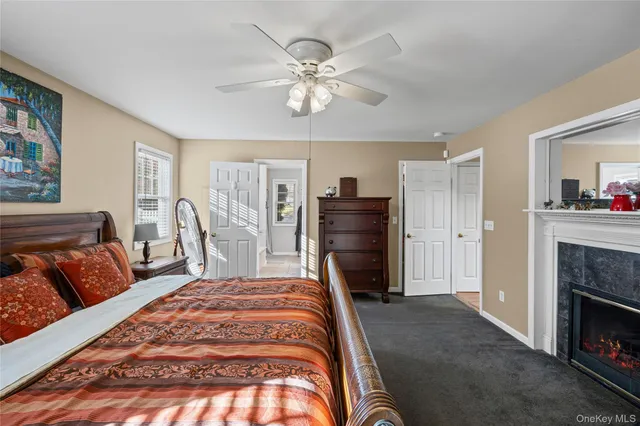 a bath tub sitting next to a white sink