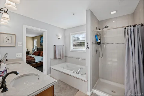 a view of an entryway with wooden floor and windows