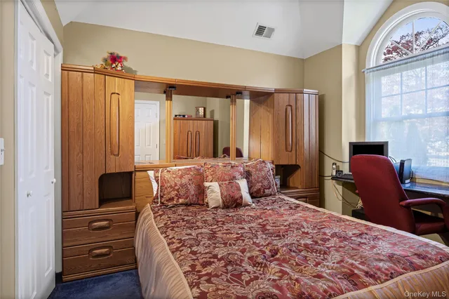 a view of balcony with furniture