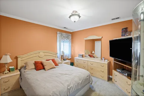 a bathroom with a toilet a sink and a mirror