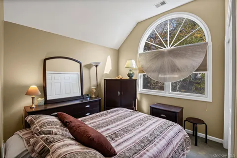 a view of a chairs and table on the wooden floor