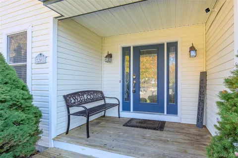 a view of a bench in front of house