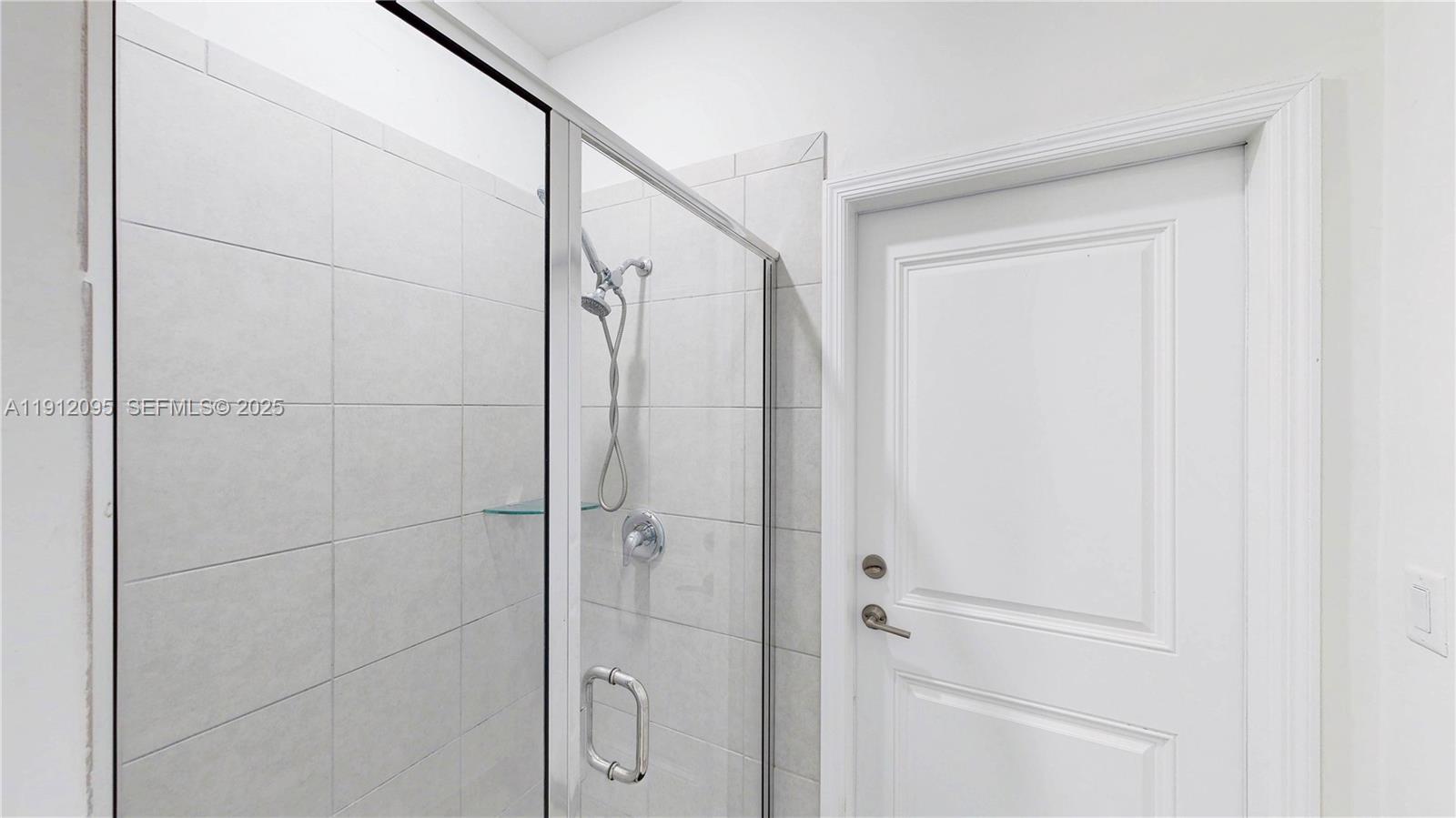 11964 Southwest 244th Street Homestead, FL 33032 - Photo 19 of 62 a bathroom with a shower