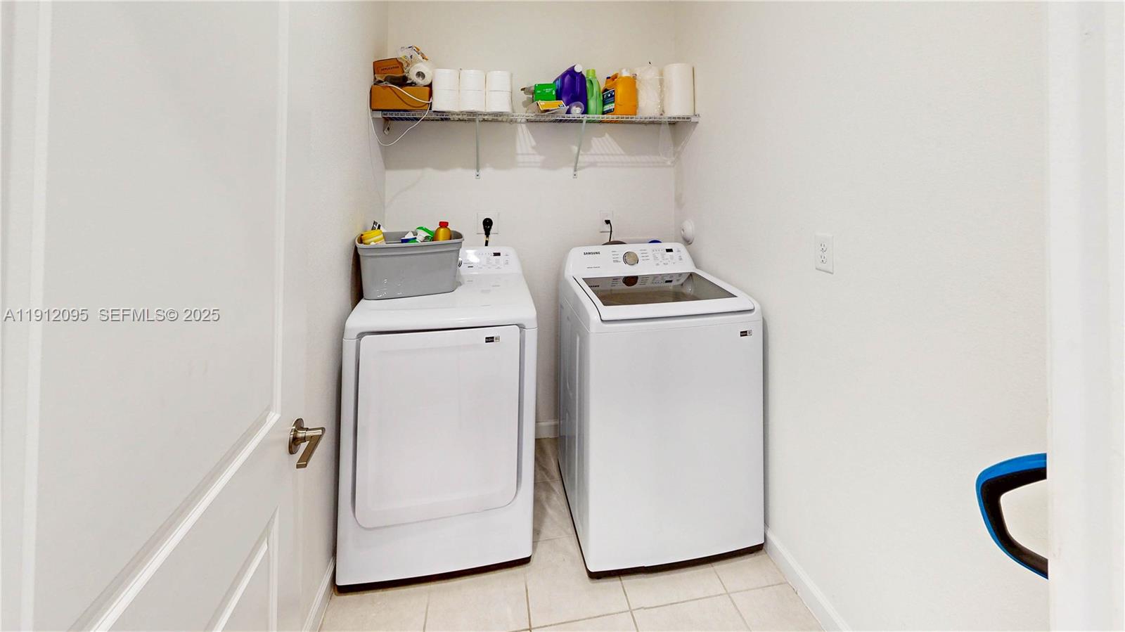 11964 Southwest 244th Street Homestead, FL 33032 - Photo 24 of 62 a utility room with dryer and washer