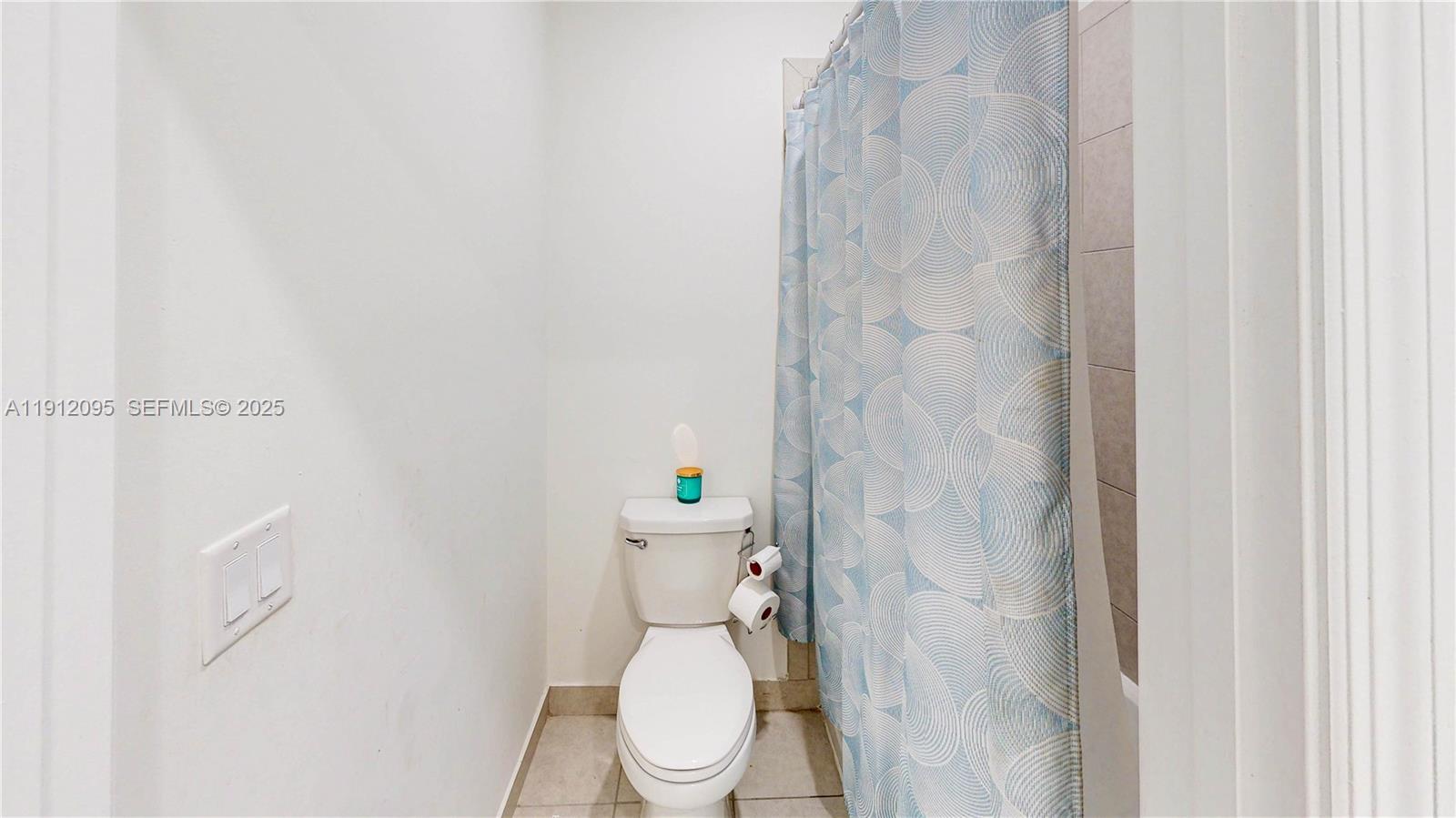 11964 Southwest 244th Street Homestead, FL 33032 - Photo 29 of 62 a white toilet sitting next to a white sink