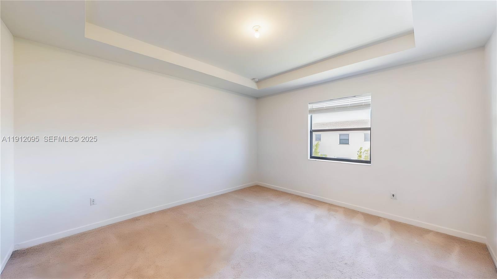 11964 Southwest 244th Street Homestead, FL 33032 - Photo 31 of 62 an empty room with a window