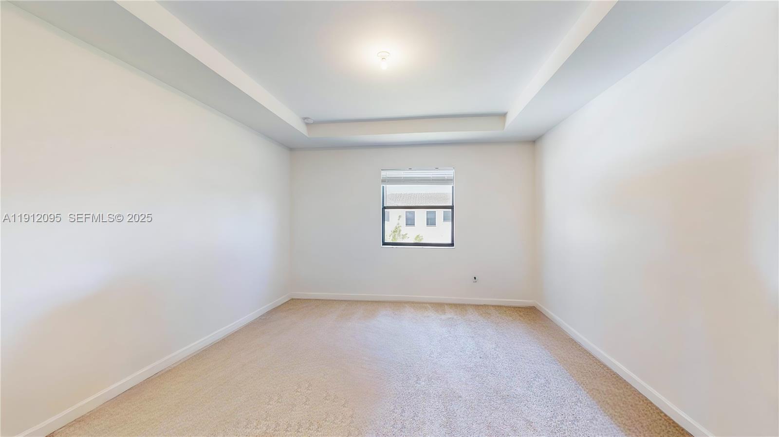 11964 Southwest 244th Street Homestead, FL 33032 - Photo 33 of 62 an empty room with a window