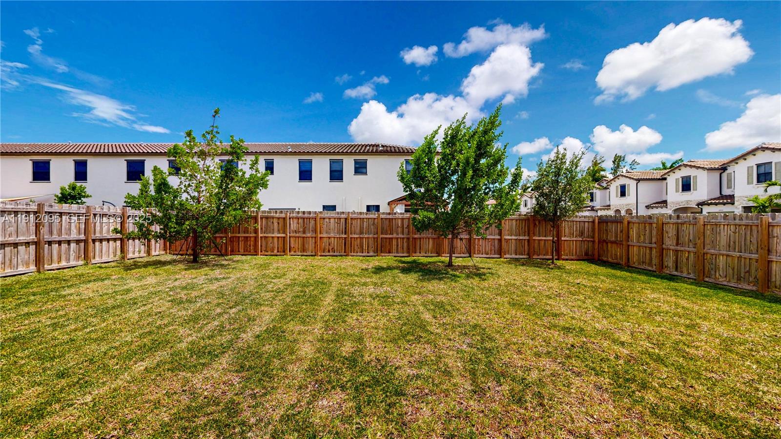 11964 Southwest 244th Street Homestead, FL 33032 - Photo 42 of 62 a house view with a backyard space