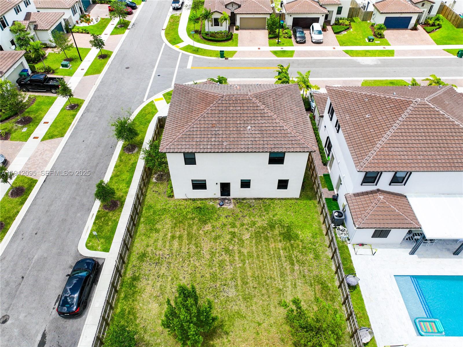 11964 Southwest 244th Street Homestead, FL 33032 - Photo 49 of 62 a aerial view of a house with garden