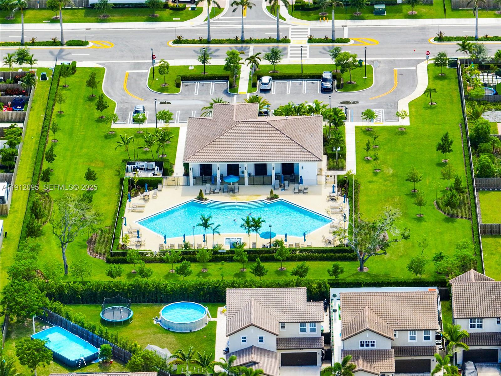 11964 Southwest 244th Street Homestead, FL 33032 - Photo 60 of 62 an aerial view of a house with yard swimming pool and outdoor seating