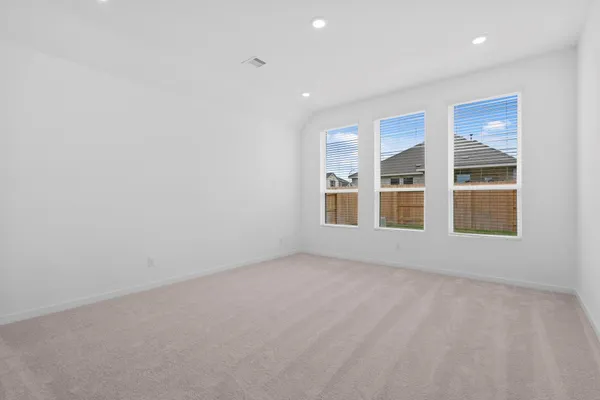 an empty room with windows