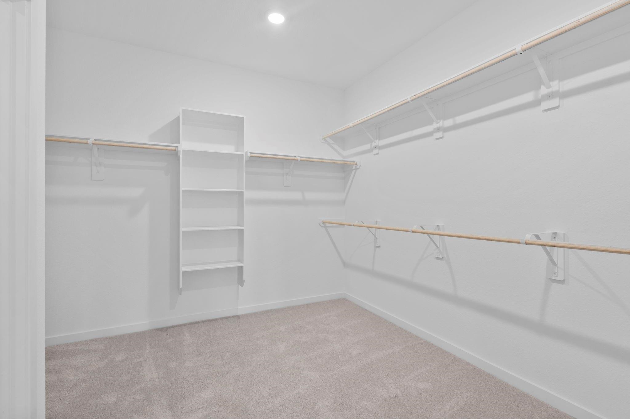 2716 Pine Bluff Drive Rosenberg, TX 77469 - Photo 18 of 32 a view of an empty walk in closet