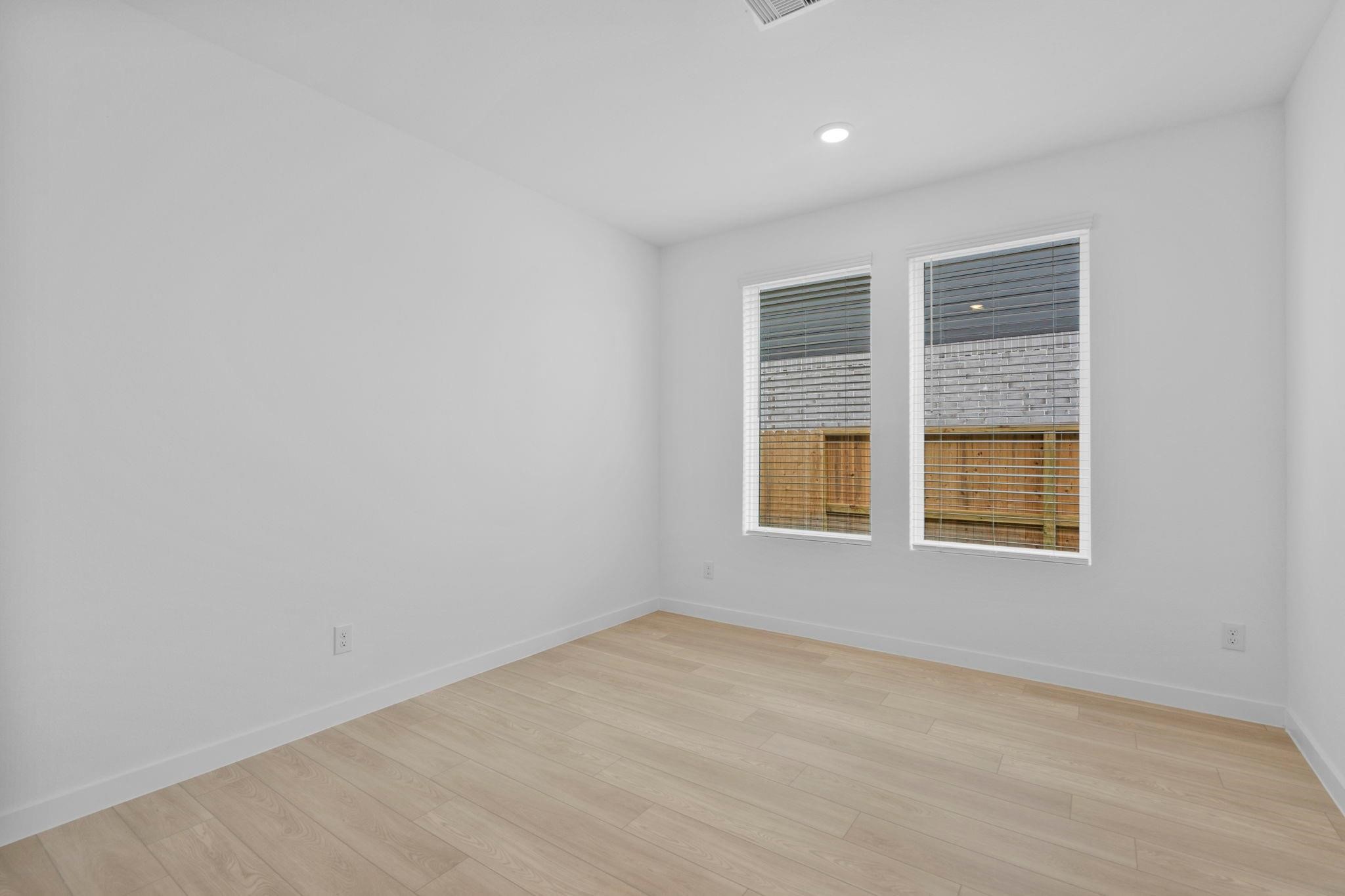 2716 Pine Bluff Drive Rosenberg, TX 77469 - Photo 26 of 32 an empty room with a window