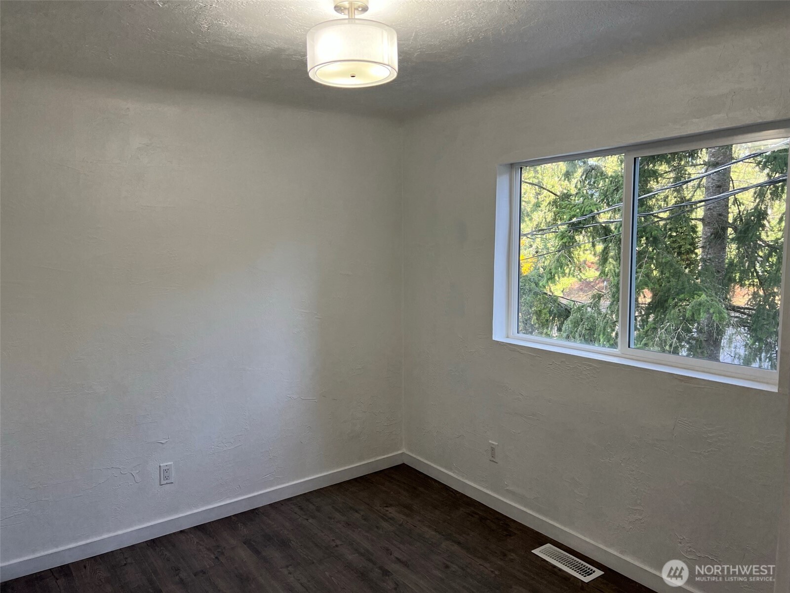 1663 Harrison Avenue Southeast Port Orchard, WA 98366 - Photo 19 of 30 an empty room with a window