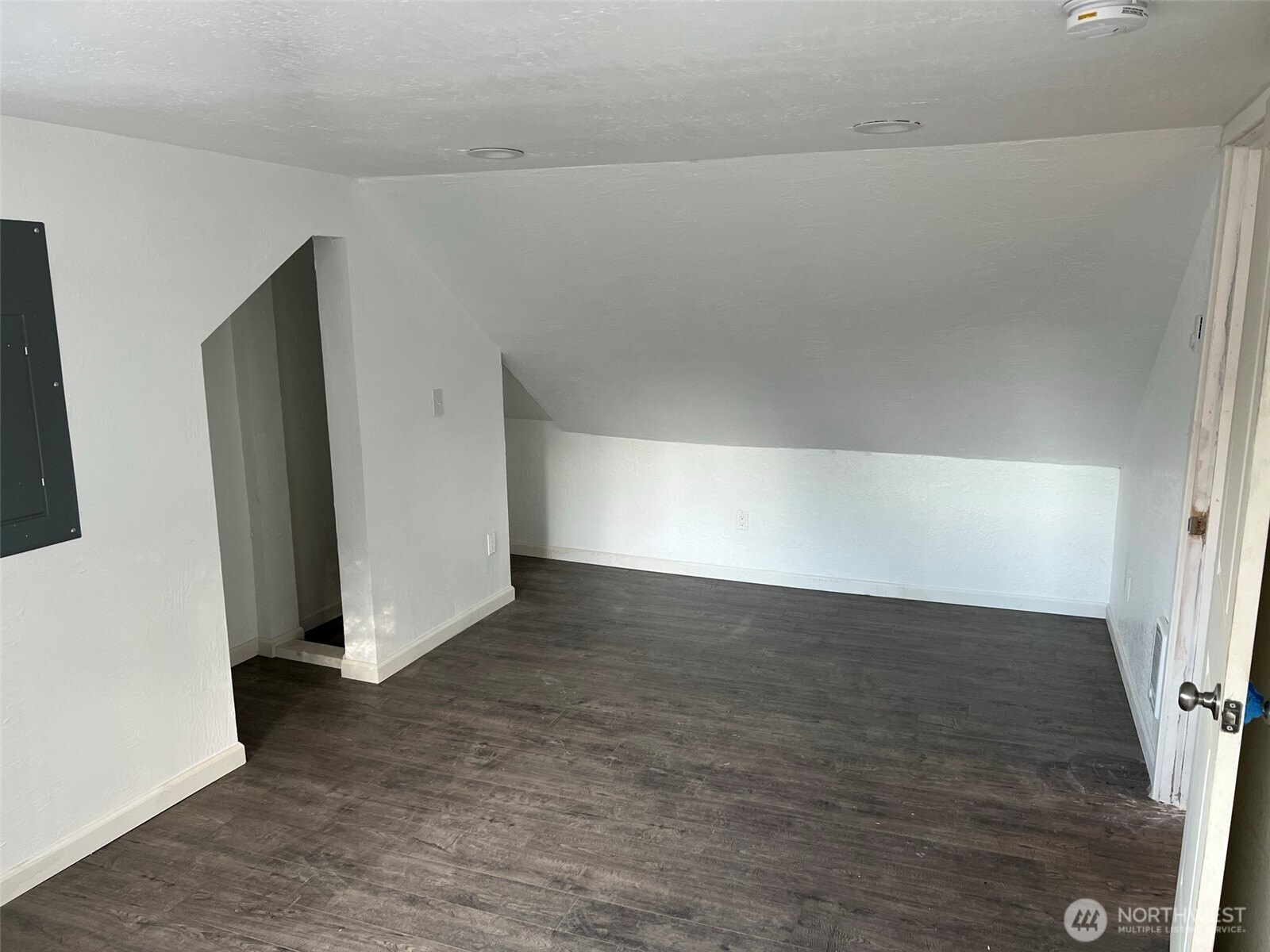 1663 Harrison Avenue Southeast Port Orchard, WA 98366 - Photo 30 of 30 a view of a big room with wooden floor