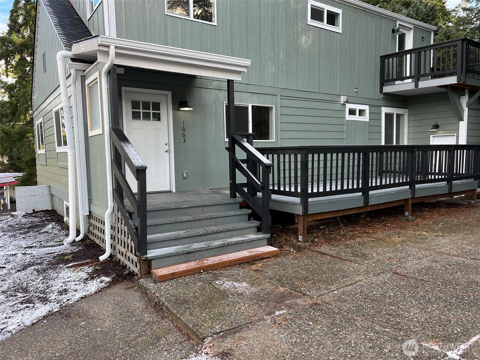 1663 Harrison Avenue Southeast Port Orchard, WA 98366 - Photo 10 of 30 a view of a house with a yard