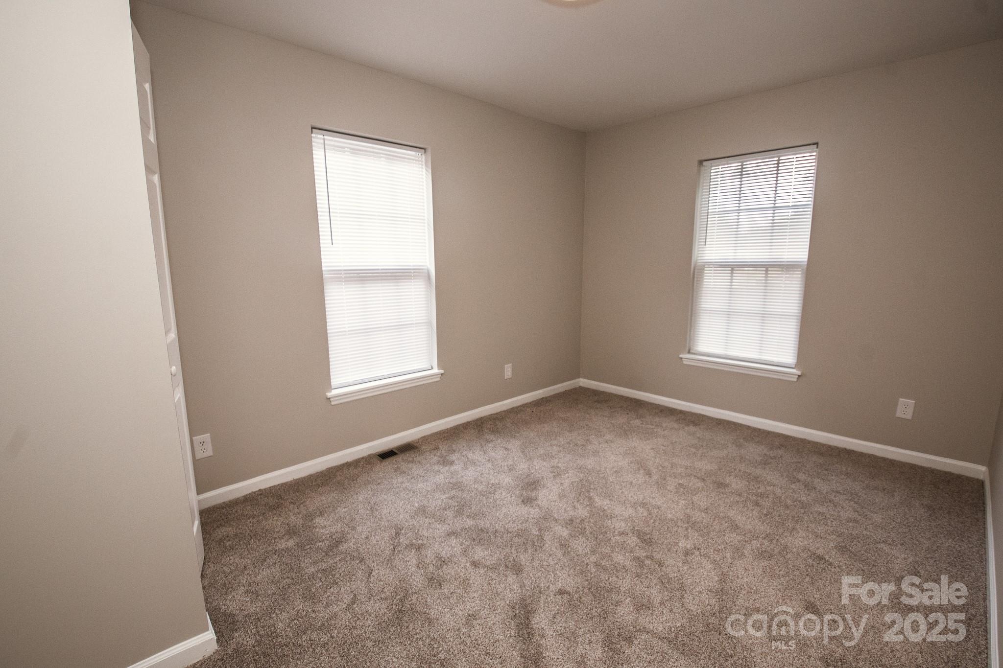 707 Summit Street Monroe, NC 28112 - Photo 13 of 23 an empty room with a window