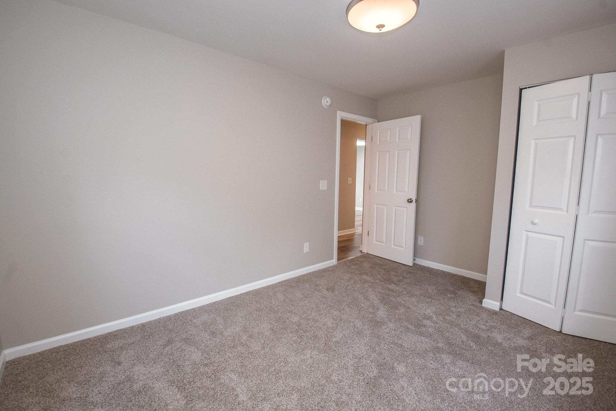 707 Summit Street Monroe, NC 28112 - Photo 14 of 23 a view of an empty room