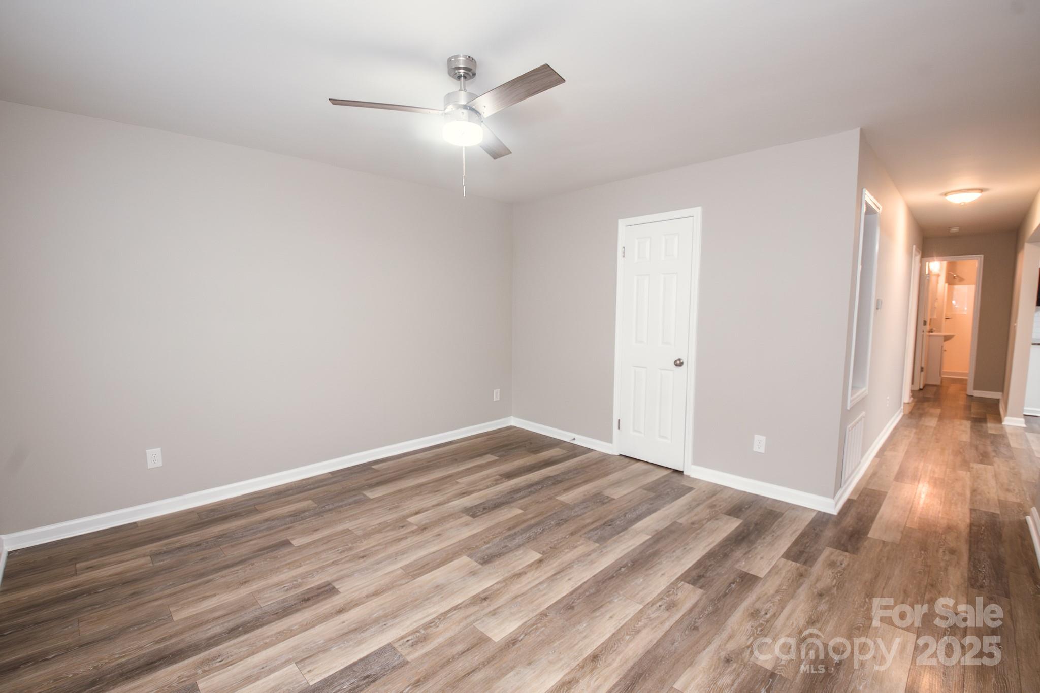 707 Summit Street Monroe, NC 28112 - Photo 7 of 23 wooden floor in an empty room