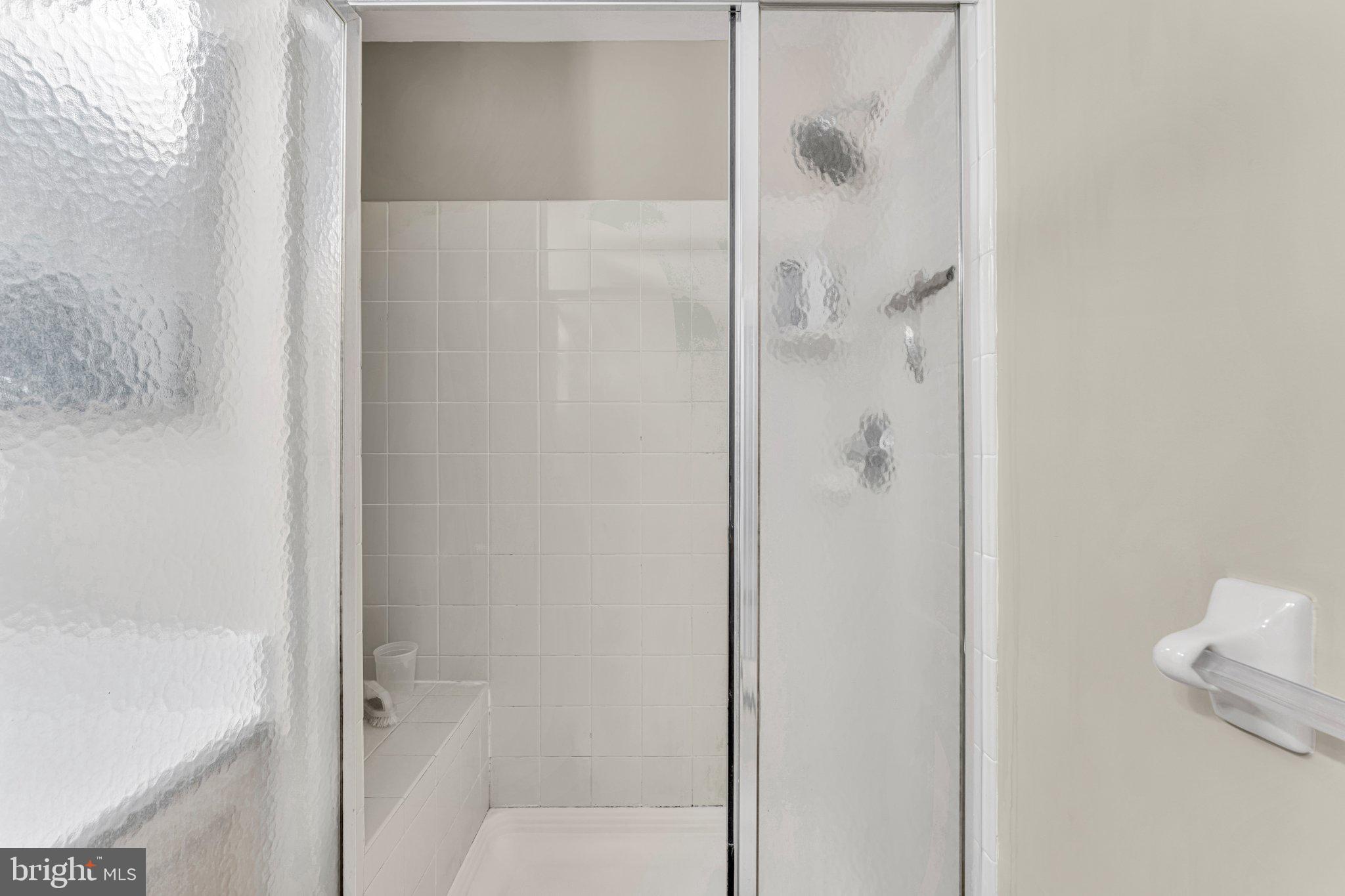 1702 Exposition Drive Williamstown, NJ 08094 - Photo 16 of 34 a bathroom with a shower