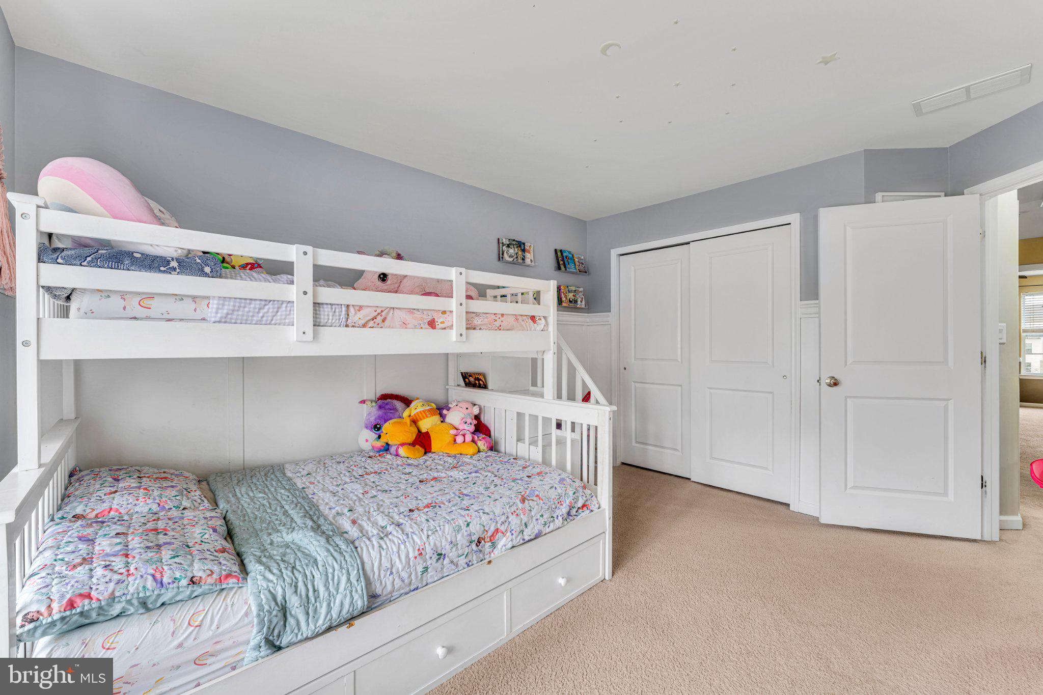 1702 Exposition Drive Williamstown, NJ 08094 - Photo 19 of 34 a bedroom with a bed and storage
