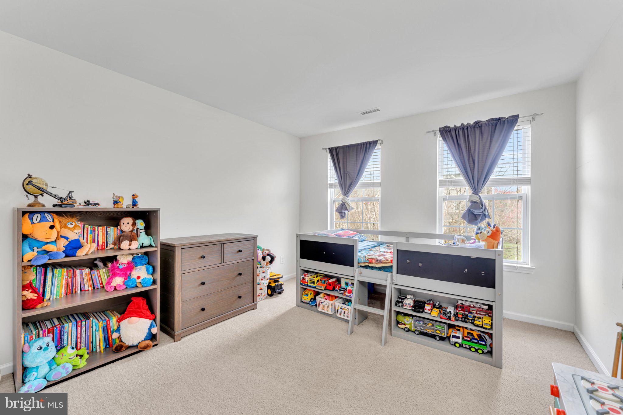 1702 Exposition Drive Williamstown, NJ 08094 - Photo 20 of 34 a room with toys and a book shelf