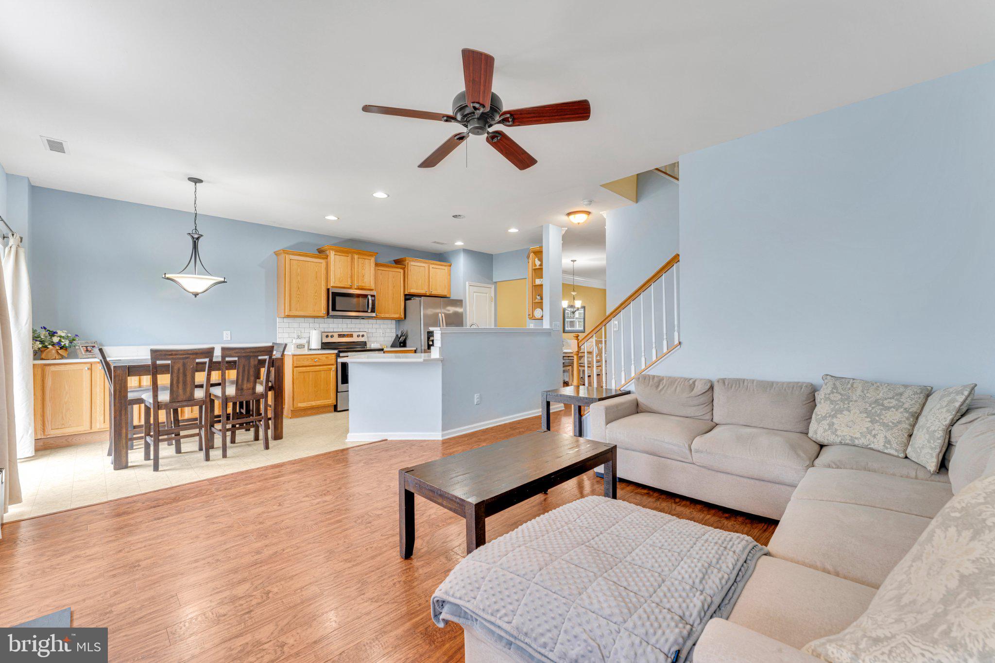 1702 Exposition Drive Williamstown, NJ 08094 - Photo 2 of 34 a living room with furniture and kitchen view