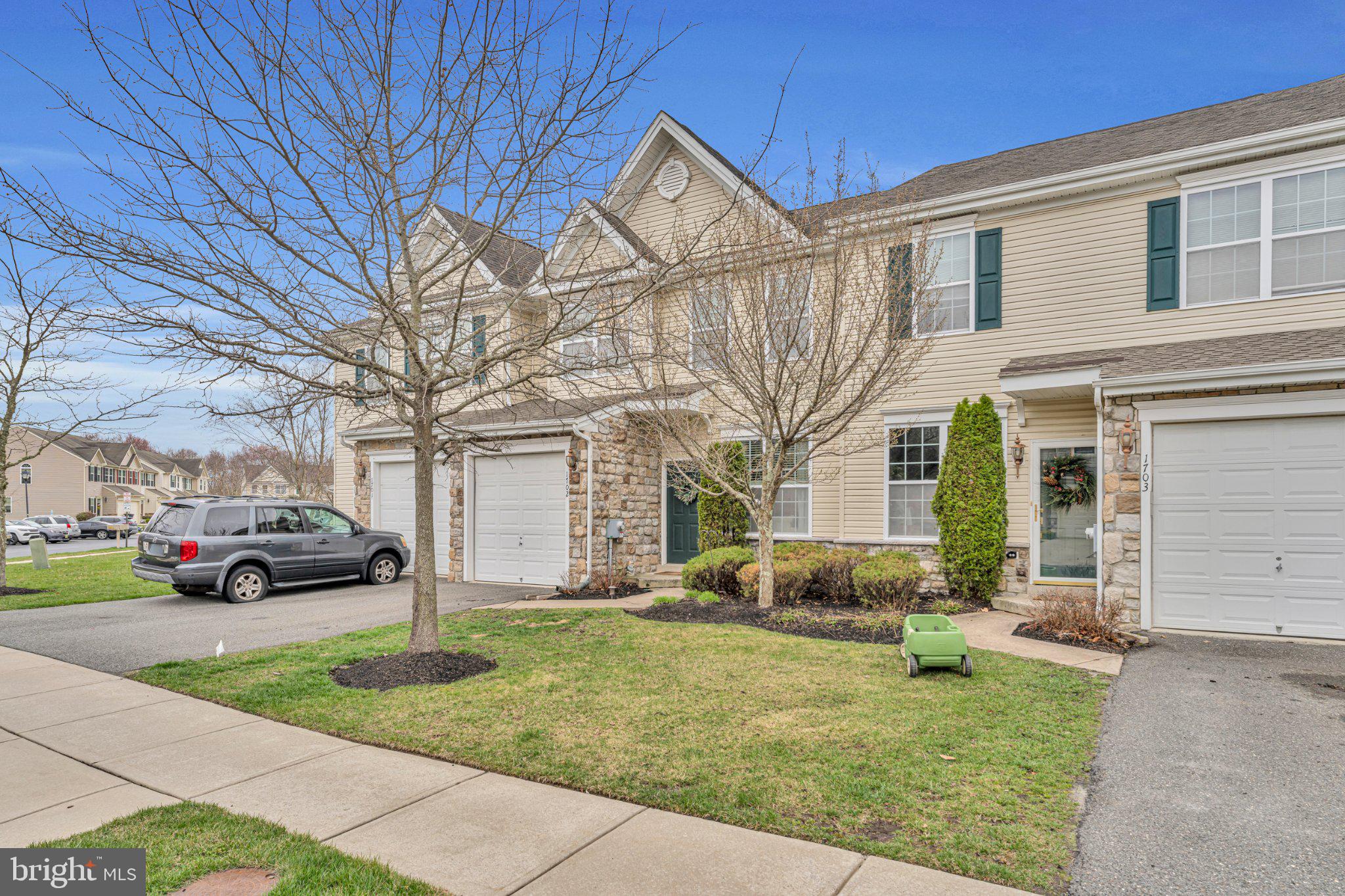 1702 Exposition Drive Williamstown, NJ 08094 - Photo 24 of 34 a front view of a house with garden