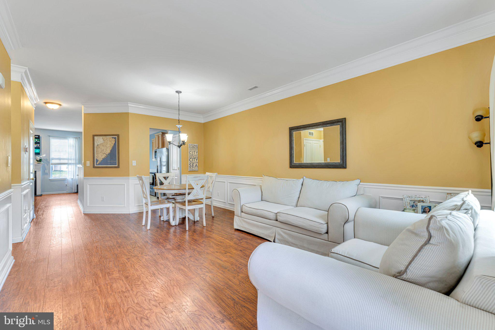 1702 Exposition Drive Williamstown, NJ 08094 - Photo 29 of 34 a living room with furniture and a table