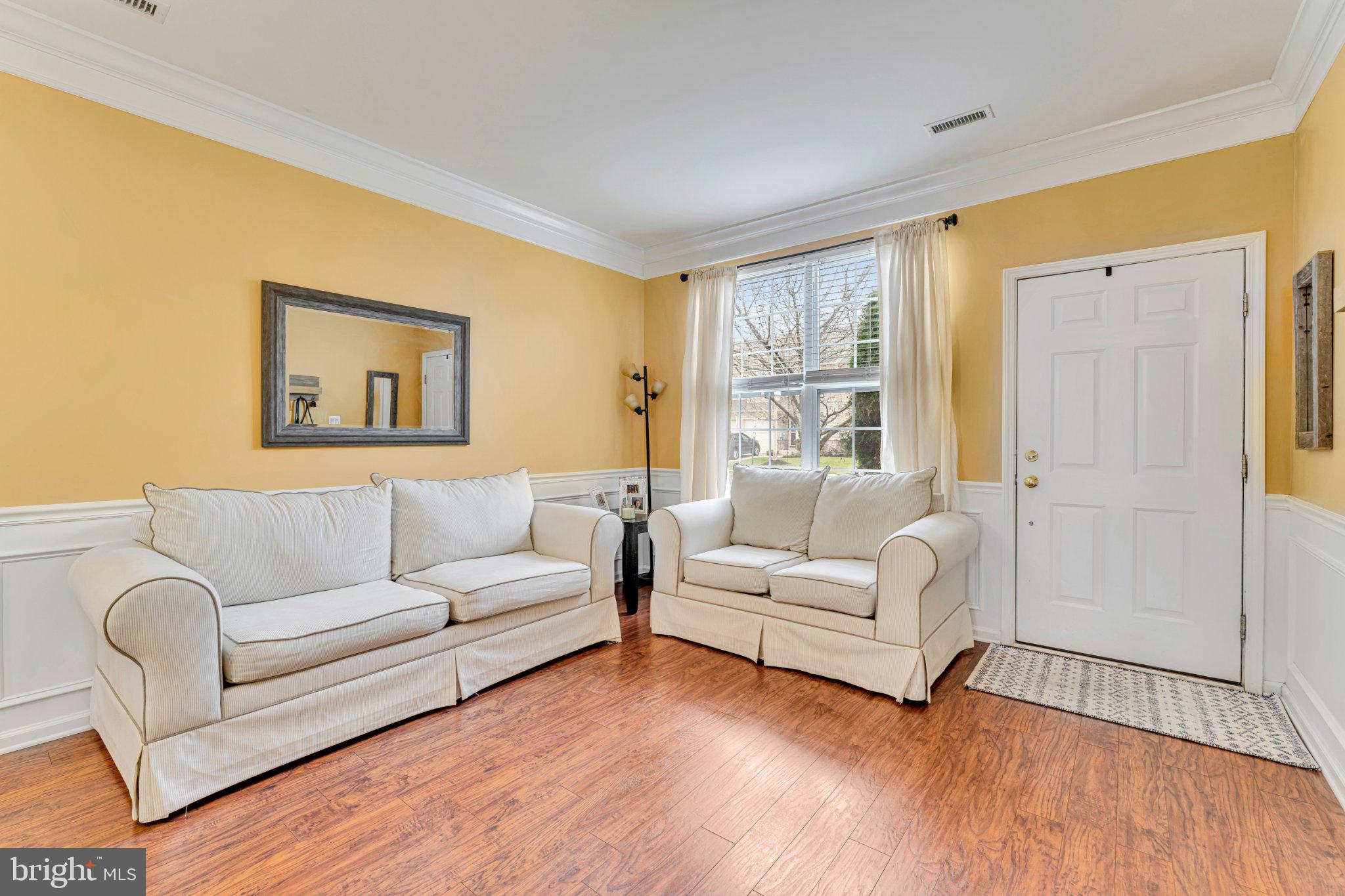 1702 Exposition Drive Williamstown, NJ 08094 - Photo 31 of 34 a living room with furniture and a large window