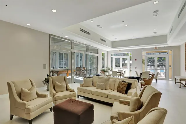 a workspace with furniture and screen