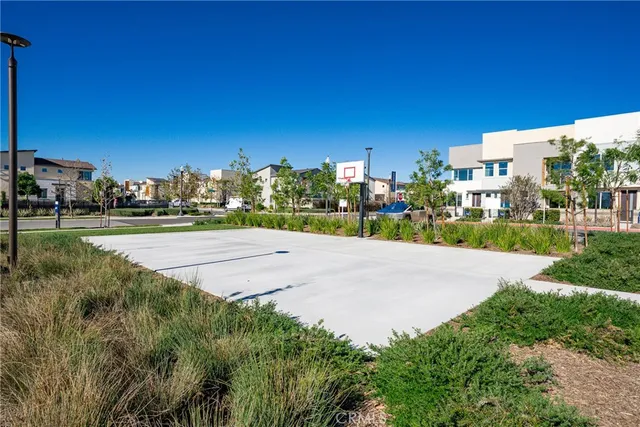 a view of a swimming pool with a yard