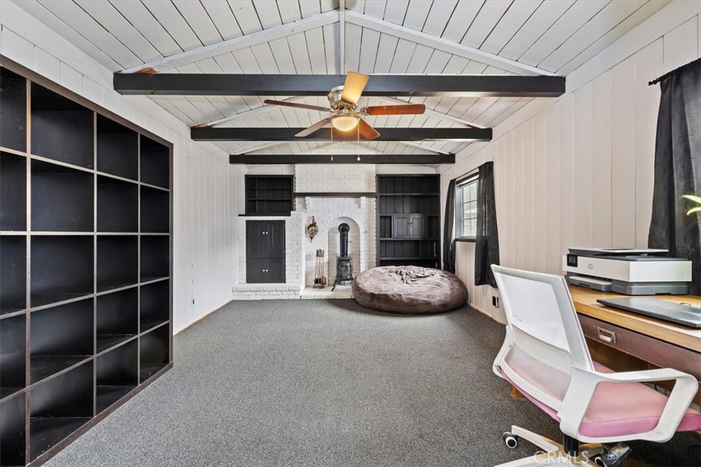 737 Edgar Avenue Beaumont, CA 92223 - Photo 22 of 43 a view of a livingroom with furniture and a ceiling fan