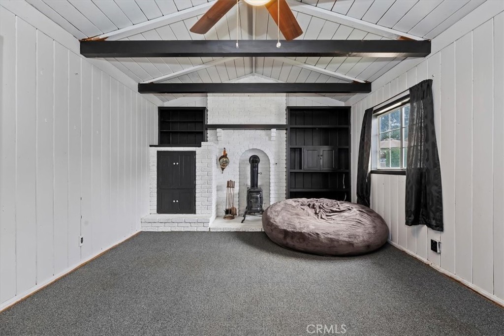 737 Edgar Avenue Beaumont, CA 92223 - Photo 23 of 43 a living room with fireplace