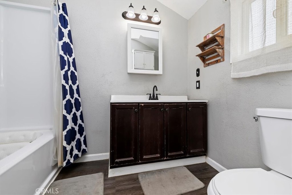 737 Edgar Avenue Beaumont, CA 92223 - Photo 28 of 43 a bathroom with a sink a toilet and shower