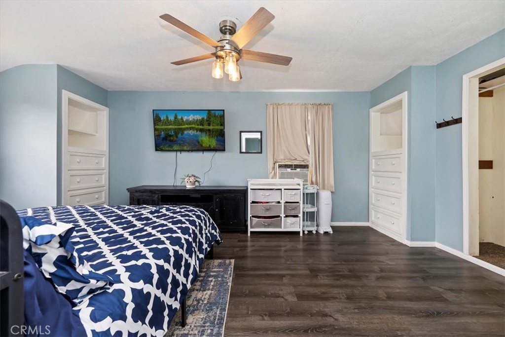 737 Edgar Avenue Beaumont, CA 92223 - Photo 29 of 43 a bedroom with a bed and a flat screen tv