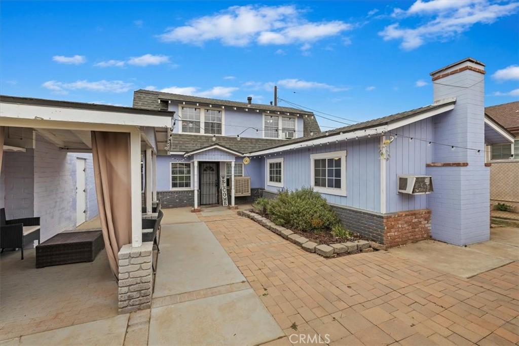 737 Edgar Avenue Beaumont, CA 92223 - Photo 3 of 43 a front view of a house with garden