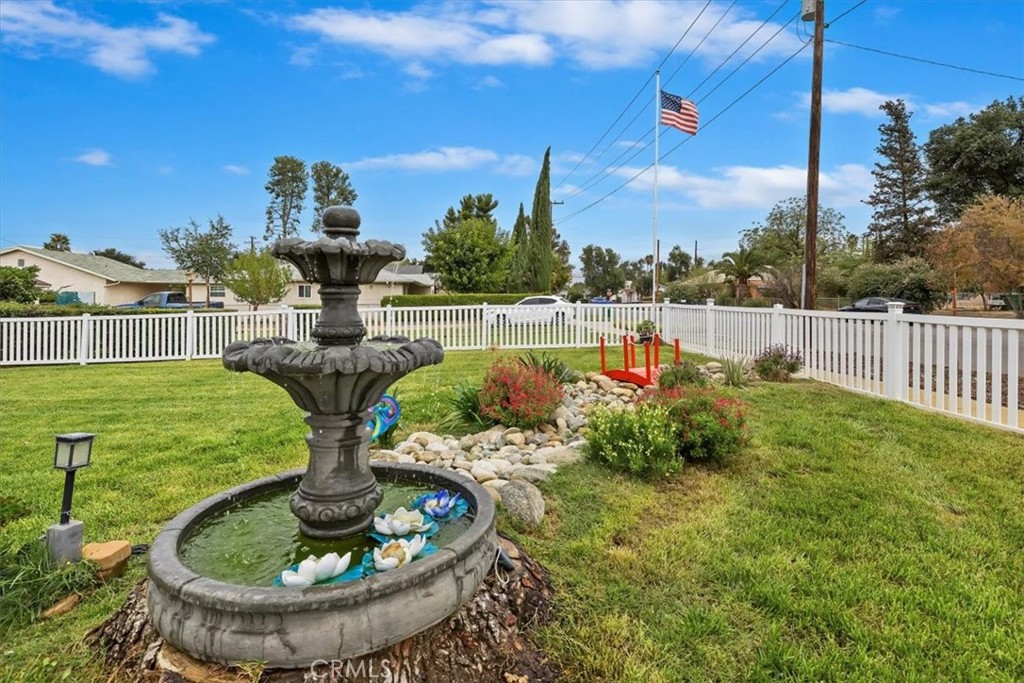 737 Edgar Avenue Beaumont, CA 92223 - Photo 35 of 43 a view of a swimming pool with a patio