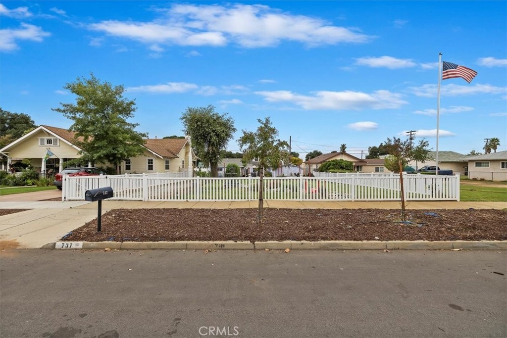737 Edgar Avenue Beaumont, CA 92223 - Photo 37 of 43 a view of a street with a houses