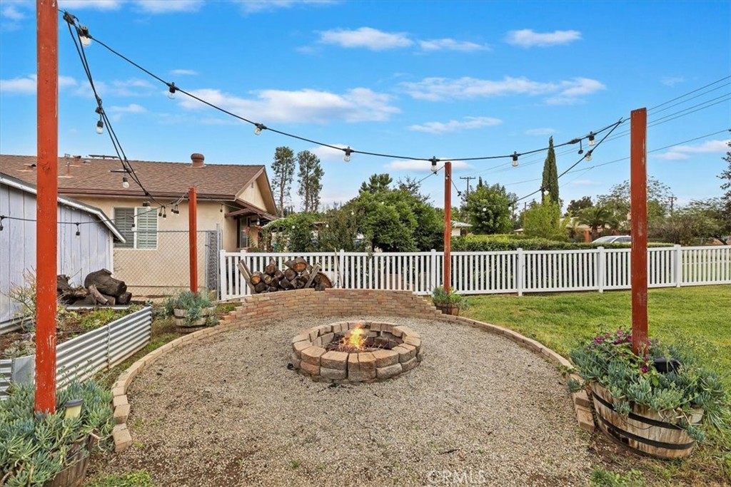 737 Edgar Avenue Beaumont, CA 92223 - Photo 41 of 43 a view of a backyard with sitting area