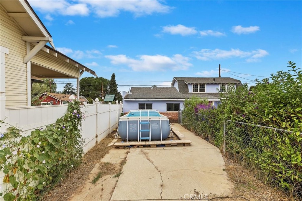 737 Edgar Avenue Beaumont, CA 92223 - Photo 42 of 43 a front view of a house with a yard