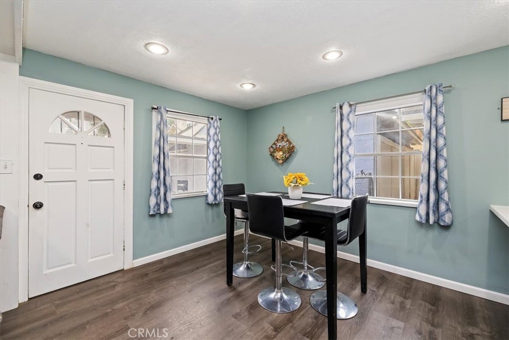 737 Edgar Avenue Beaumont, CA 92223 - Photo 7 of 43 a view of a dining room with furniture and a window
