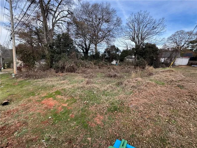 a fire hydrant in the middle of a field