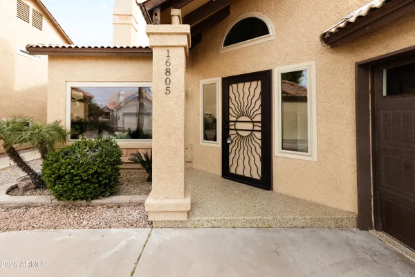 a front view of a house with a porch