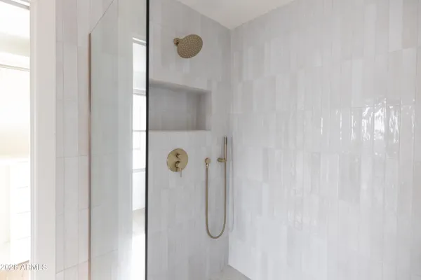 a bath room with a toilet a sink and a bathtub