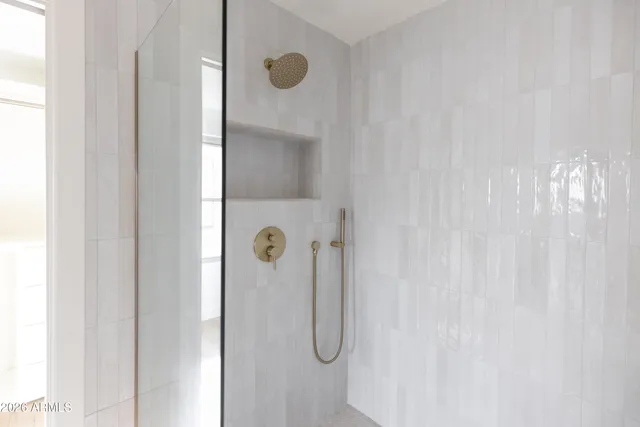 a bath room with a toilet a sink and a bathtub