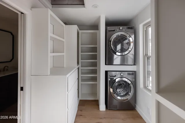 a utility room with dryer and washer